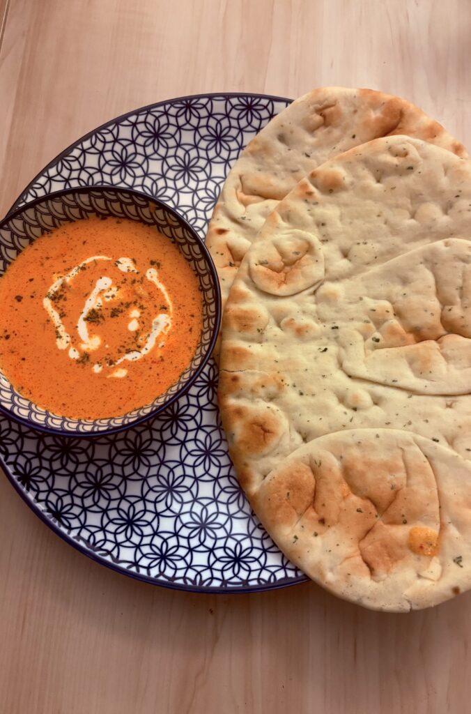 Butter Chicken recipe served with naan