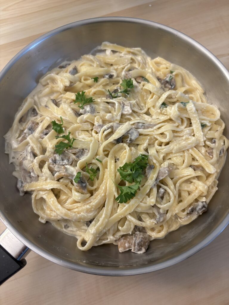 mushroom alfredo pasta in a pan