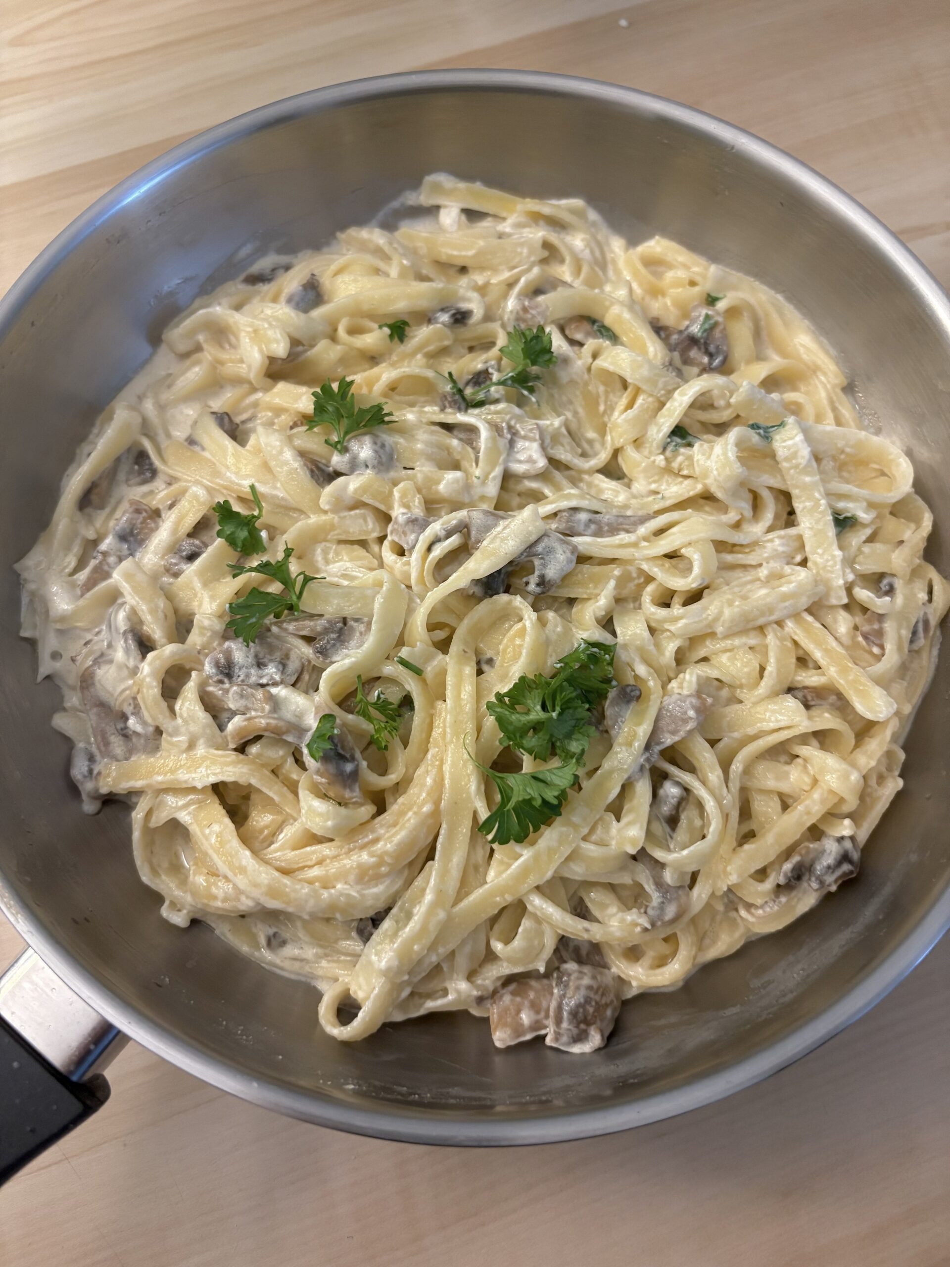 mushroom alfredo pasta in a pan